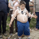 Image for article titled Is This Boy Magnetic? No, Just a Cute Fat Kid with Sticky Skin